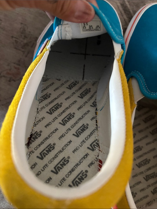 The Simpsons Vans Kids Colorblock Slip-On Sneakers in Teal, Yellow & Red